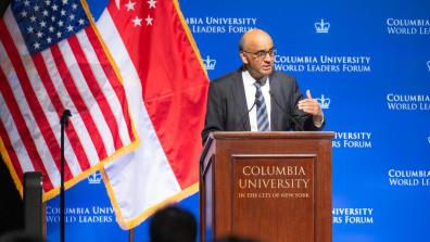 President Tharman Shanmugaratnam of Singapore speaks from the World Leaders Forum lectern.