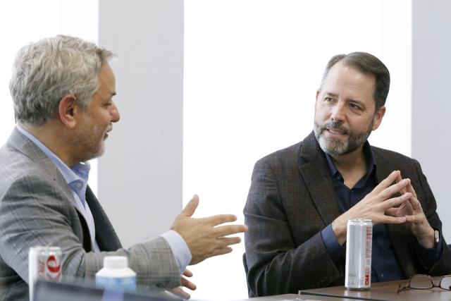Evan Wolff (left) and Chad Sweet (right) in conversation